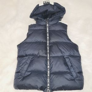 Boys 5/6 navy blue and white puffer vest.